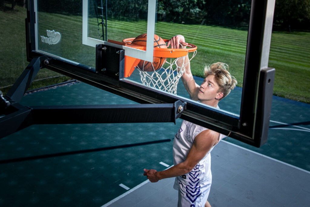 Sam at the rim, senior session on the court