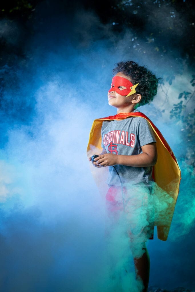 Kid in Superhero Costume
