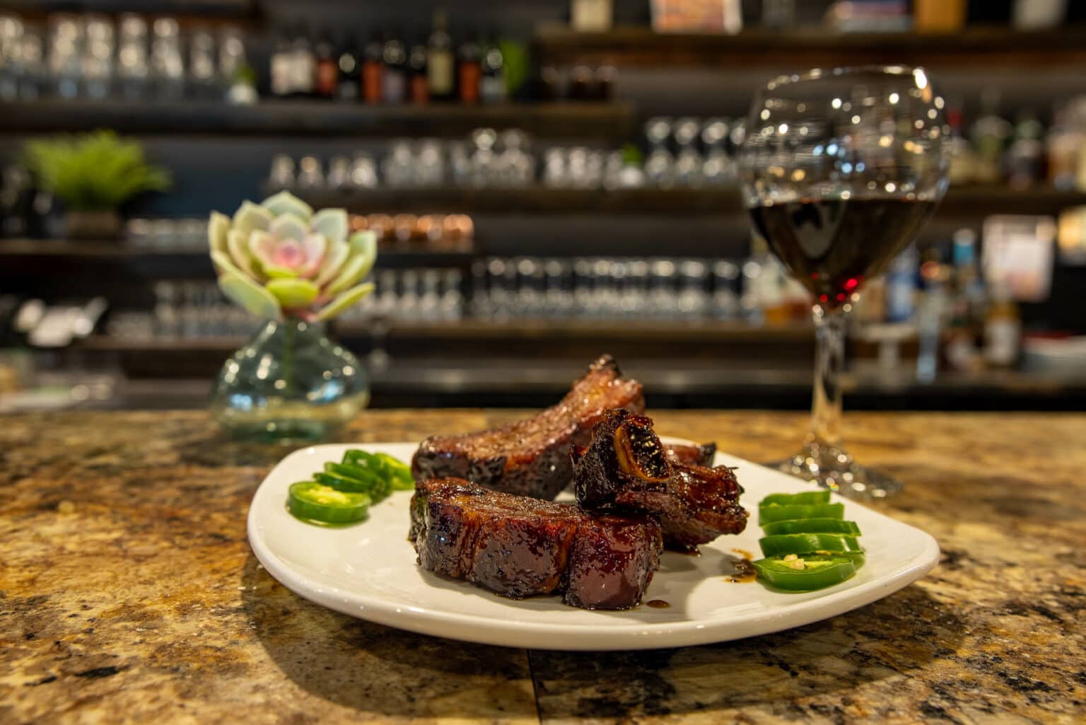 A plated steak on the bar at a La Crosse restaurant