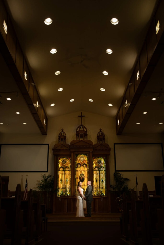 Couple at the altar by La Crosse, WI Photographer Jeff Wiswell