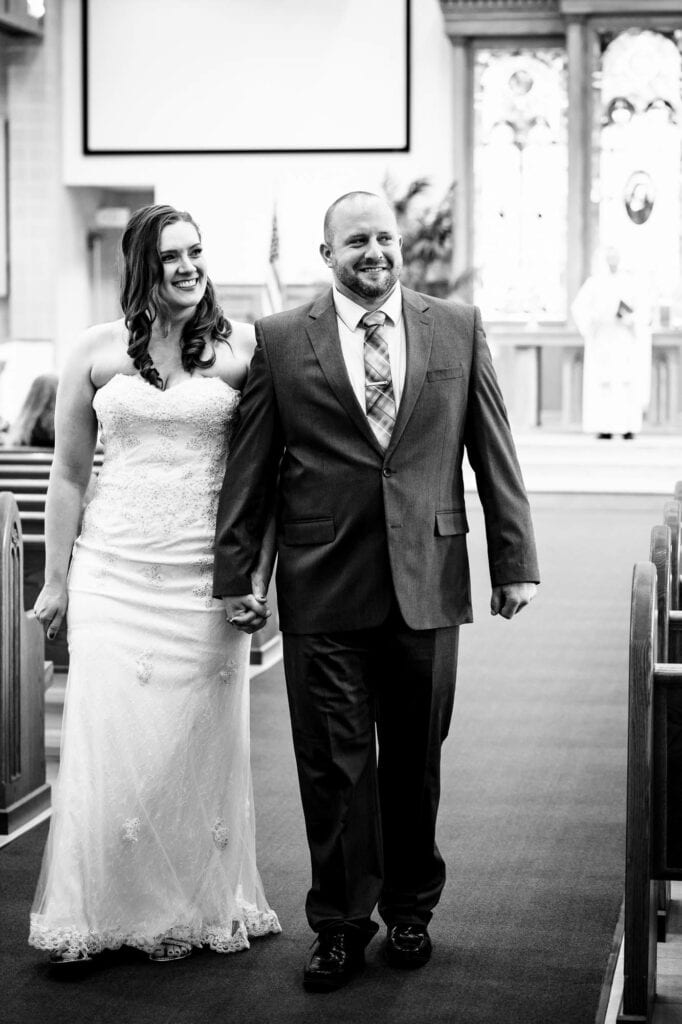Couple at the end of a wedding by La Crosse, WI Photographer Jeff Wiswell
