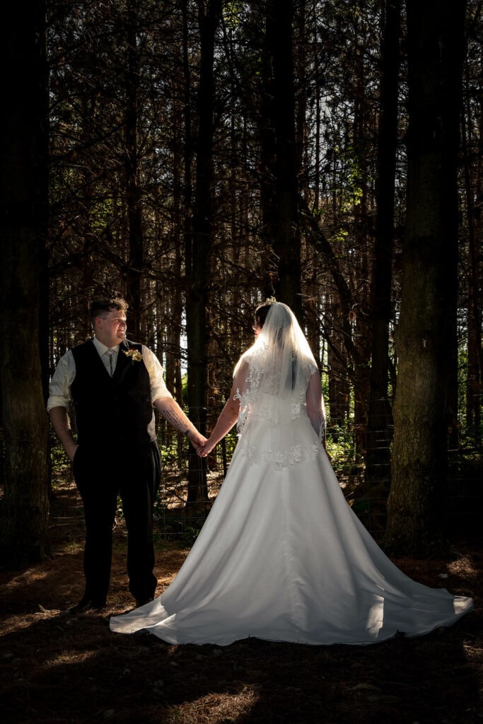 Bride in Forest by La Crosse, WI Photographer Jeff Wiswell