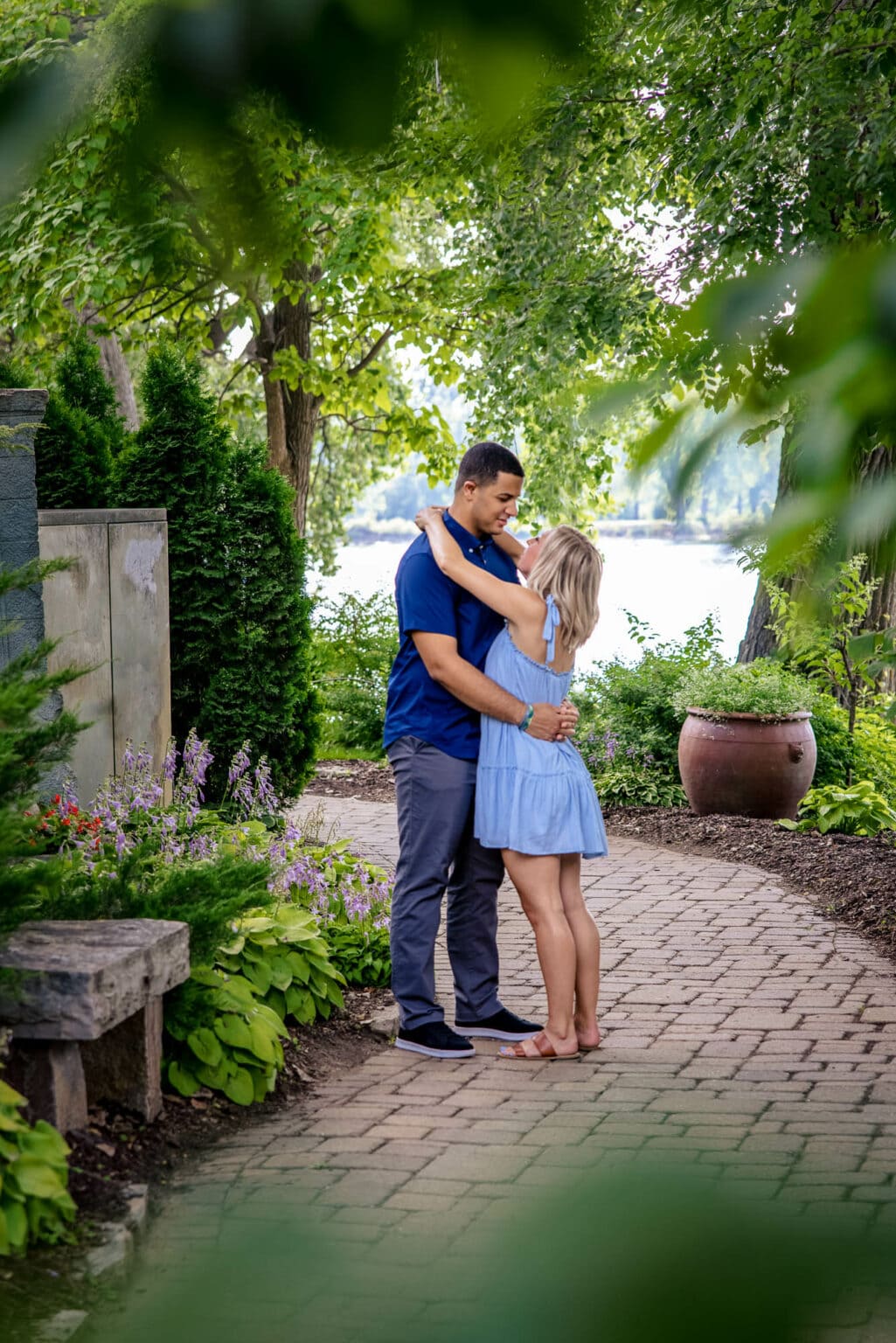 An engaged couple on a garden path in the International Friendship Gardens, La Crosse