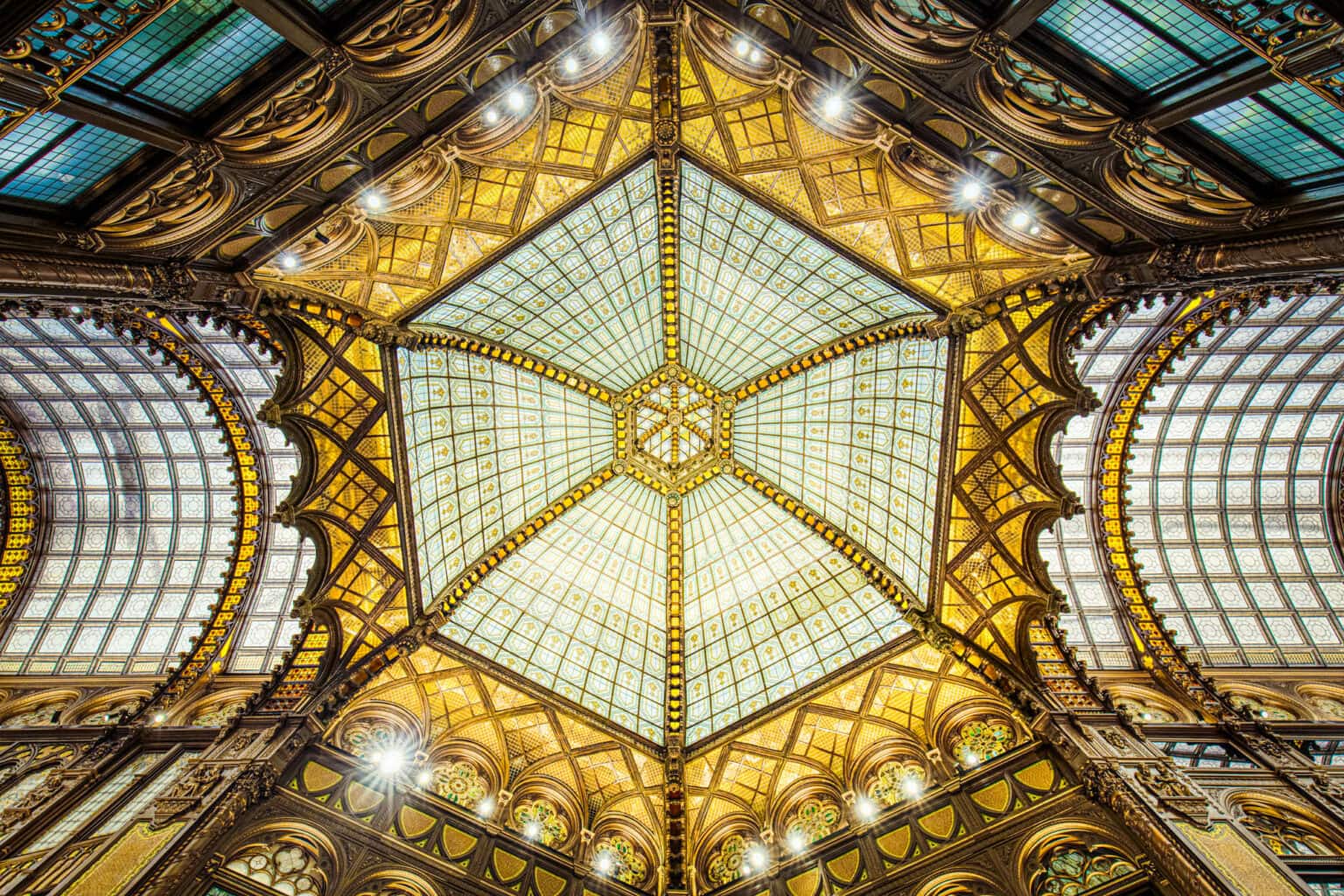 The gilded glass ceiling of a Budapest cafe