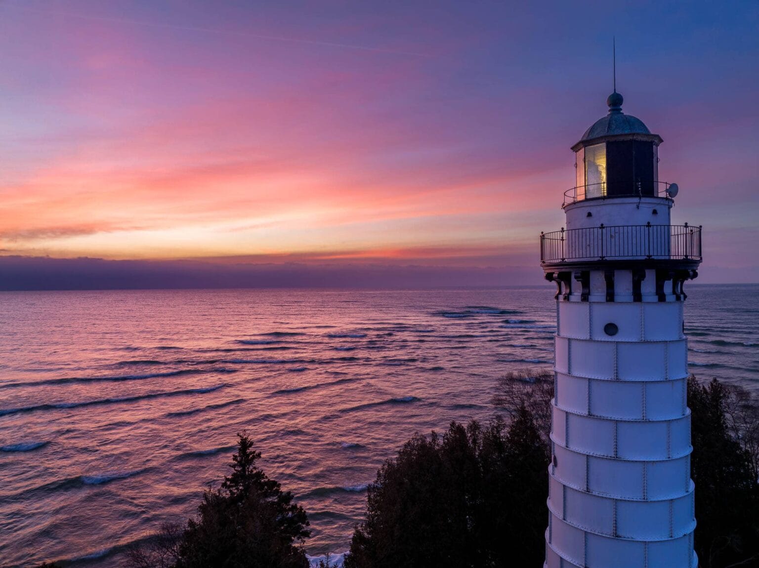 Cana Island lighthouse at sunrise from the air