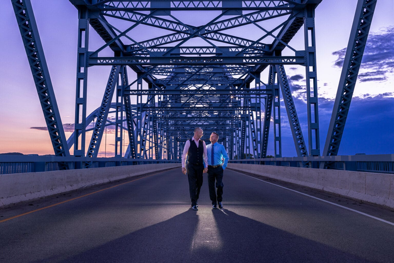 An engaged couple on the Cass Street Bridge at blue hour, La Crosse