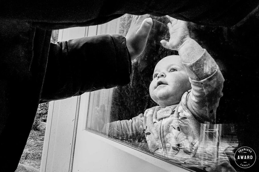 Award-winning family documentary photograph by J.L. Wiswell Photography