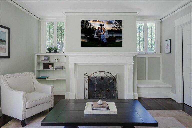 An engaged couple by a fireplace, hung as a portrait