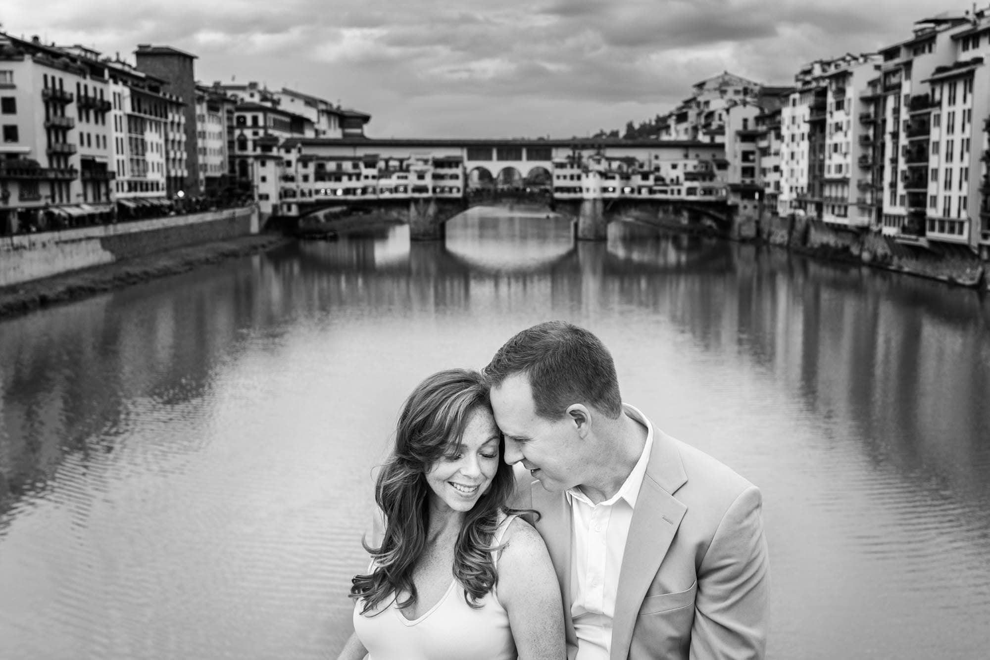Jeff and Alisha by the Arno, the Ponte Vecchio behind them