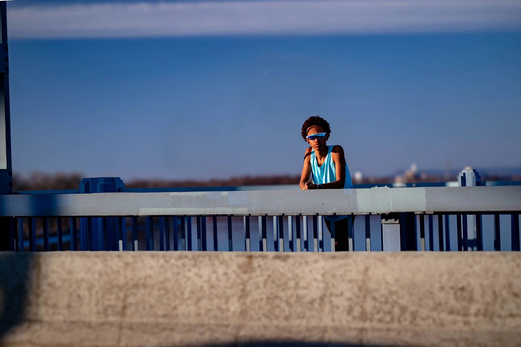 High school senior on the Cass Street Bridge railing, La Crosse WI