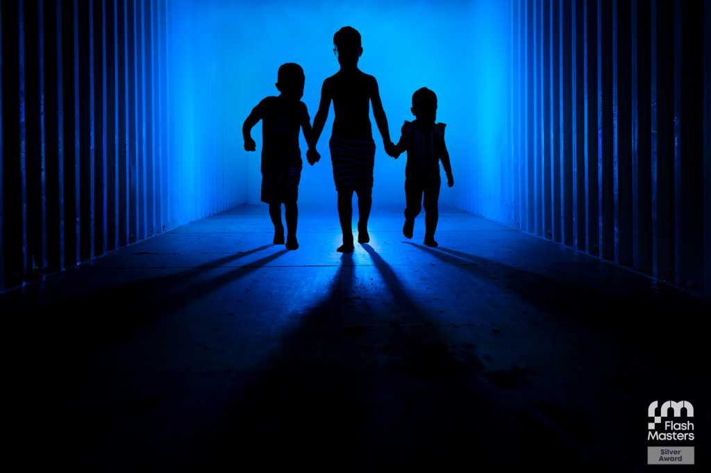 Award-winning family documentary photograph by J.L. Wiswell Photography