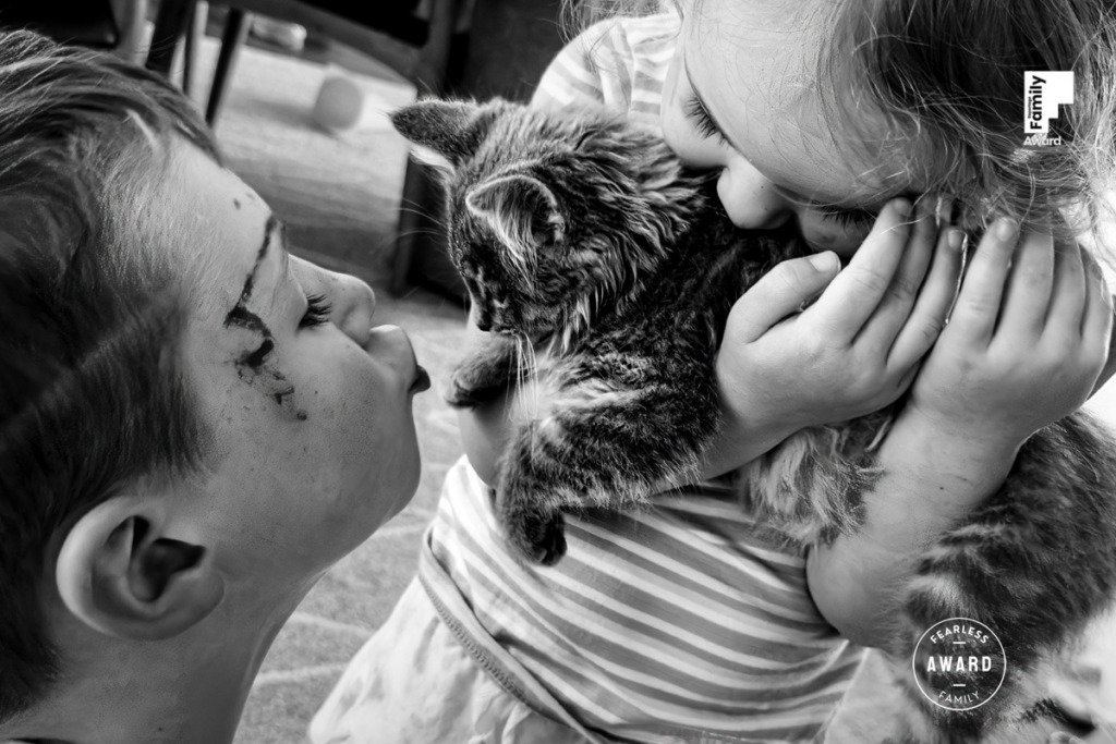 Award-winning family documentary photograph by J.L. Wiswell Photography