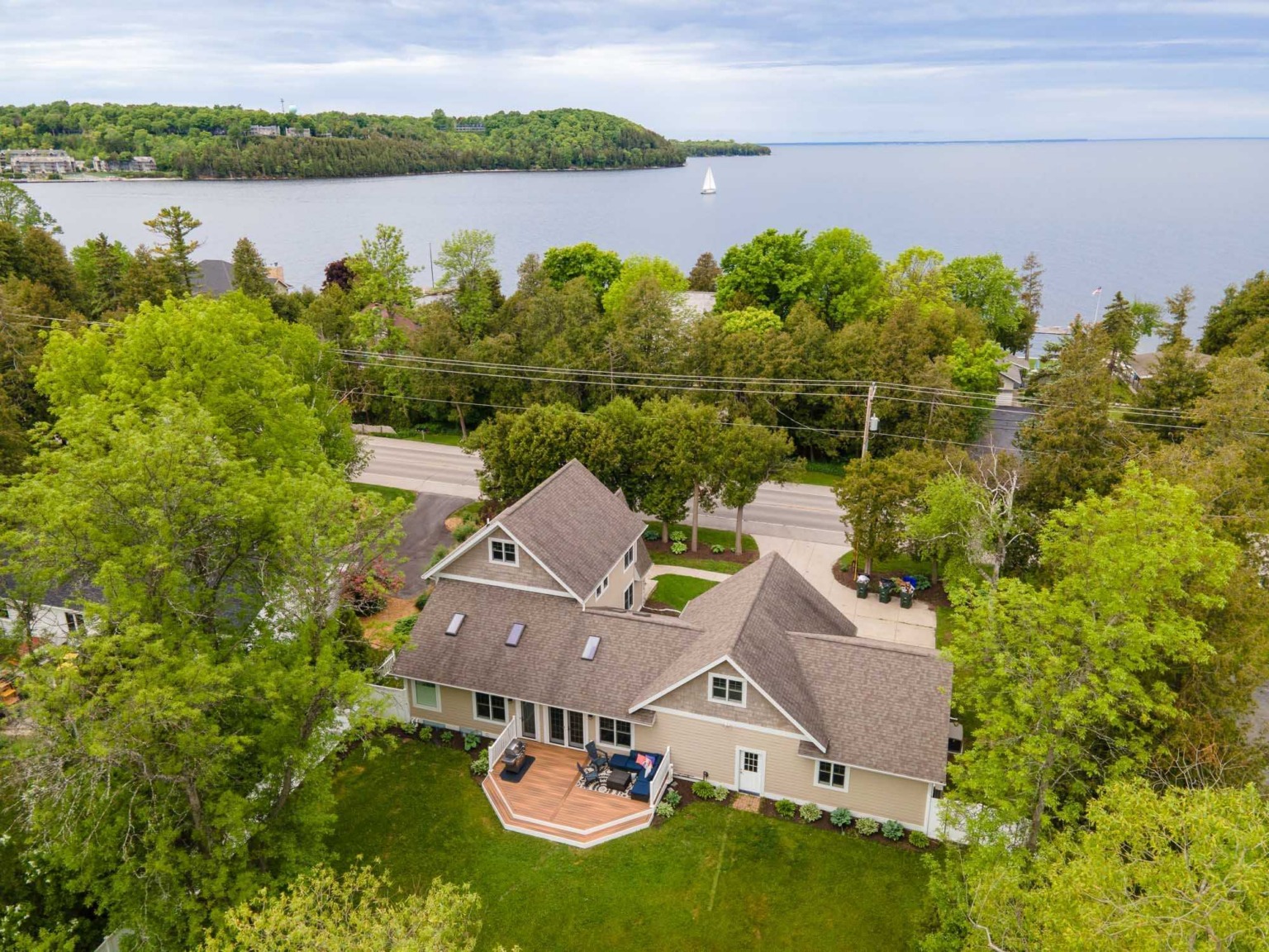 Aerial view of a Door County home above the bay