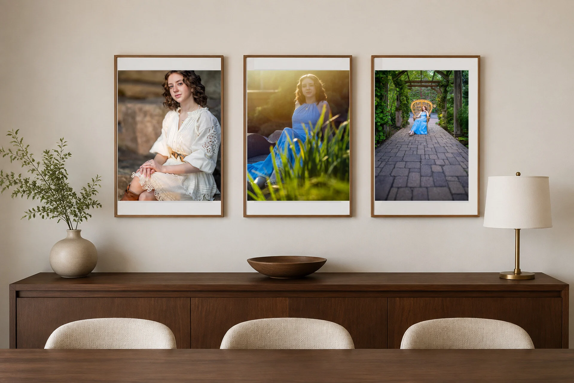 A senior portrait three framed portraits above a sideboard