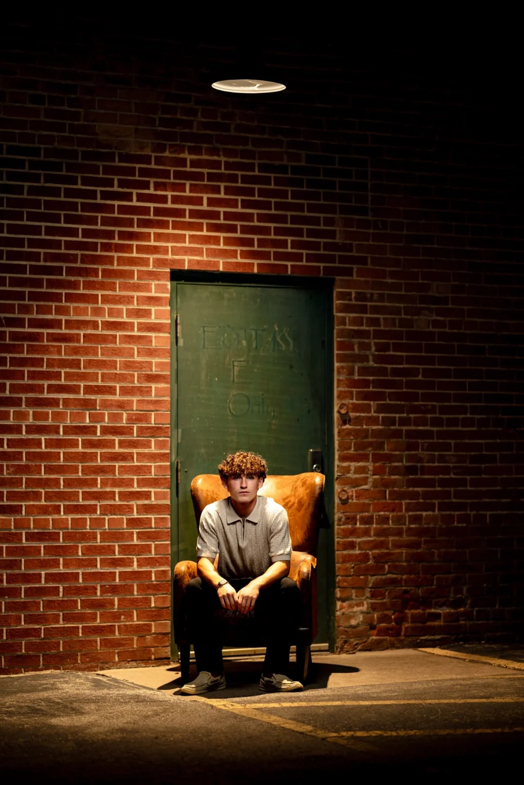 Finished portrait — Night alley, an armchair, one softbox on a boom.