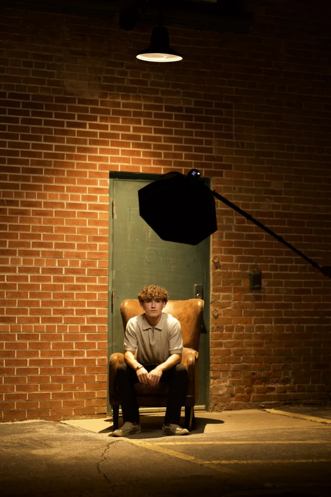 Straight out of the camera — Night shoot, an armchair, one softbox on a boom.